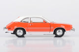Motormax 1974 Ford Pinto 1:24 Scale Diecast Replica Model Forgotten Classics Series 79044 Orange with White roof and Trims